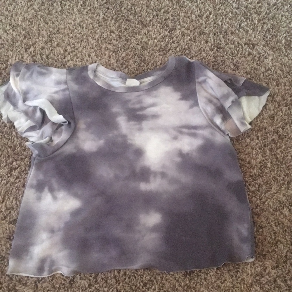 purple and white tye dye shirt